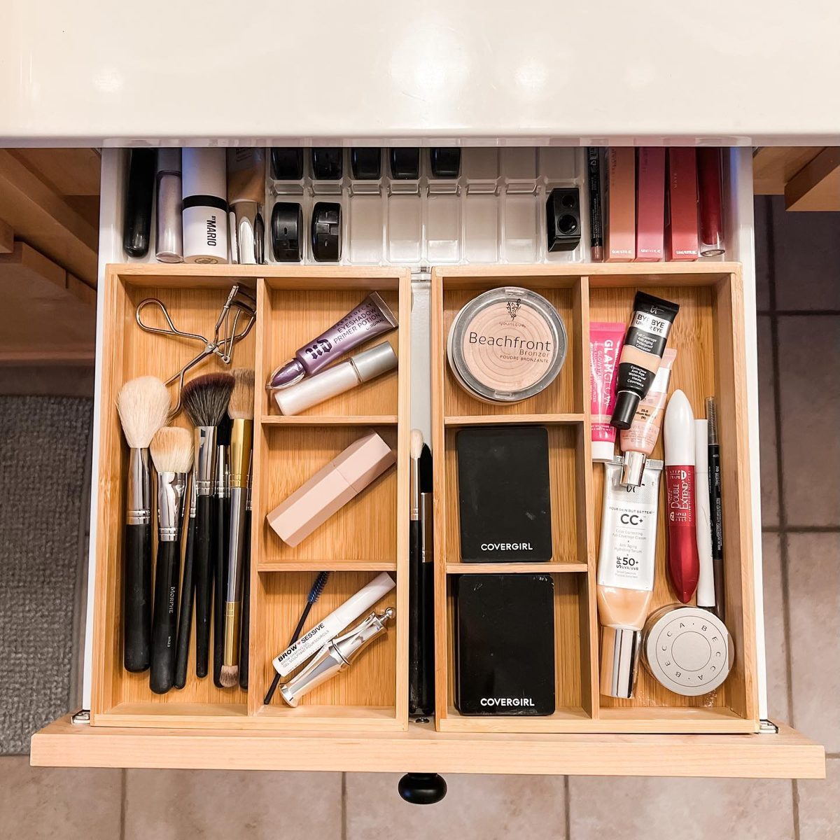 Bathroom drawer with bamboo dividers for makeup and brushes